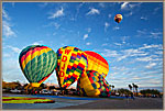 5 Colorful Ballons Being Raised