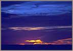 Sunset With Distant Freighter