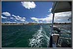 Boat and wake leaving Port Lincoln.
