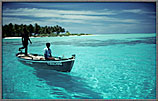Boatmen In A Shallow Lagoon