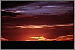 Sunset With Distant Freighter