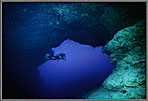 Diver In Giant Cavern