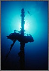 Tiny Diver With Mast Of Wreck